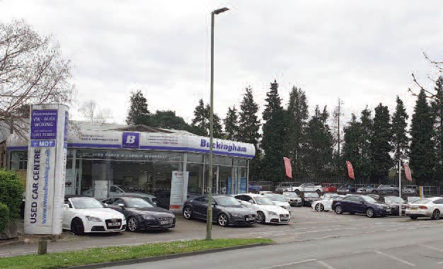 Land & buildings for sale in Woking comprising: Motor vehicle garage/showroom with residential development potential. 