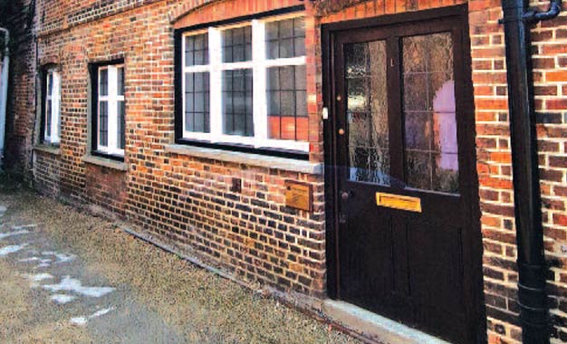 Self-contained office (Class E) building on Godalming High Street.